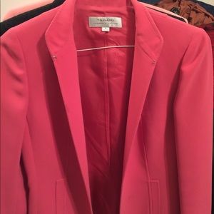 Multiple blazers from different designers